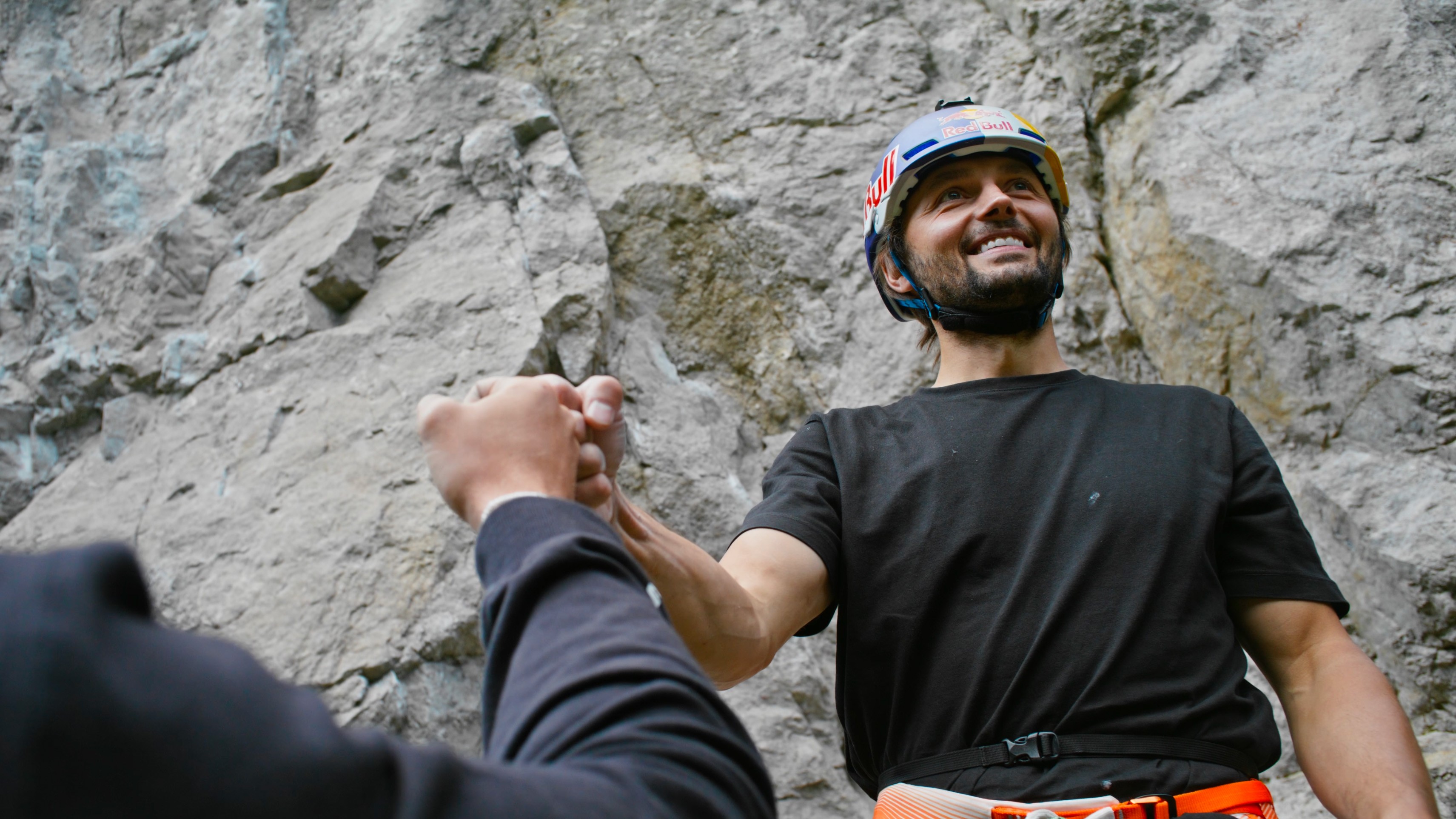 Woman with sunglasses walking down runway