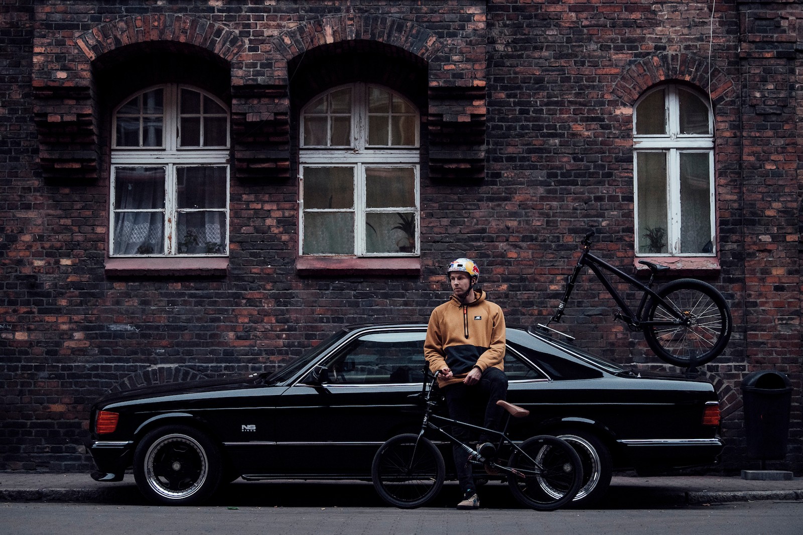 Woman with sunglasses walking down runway
