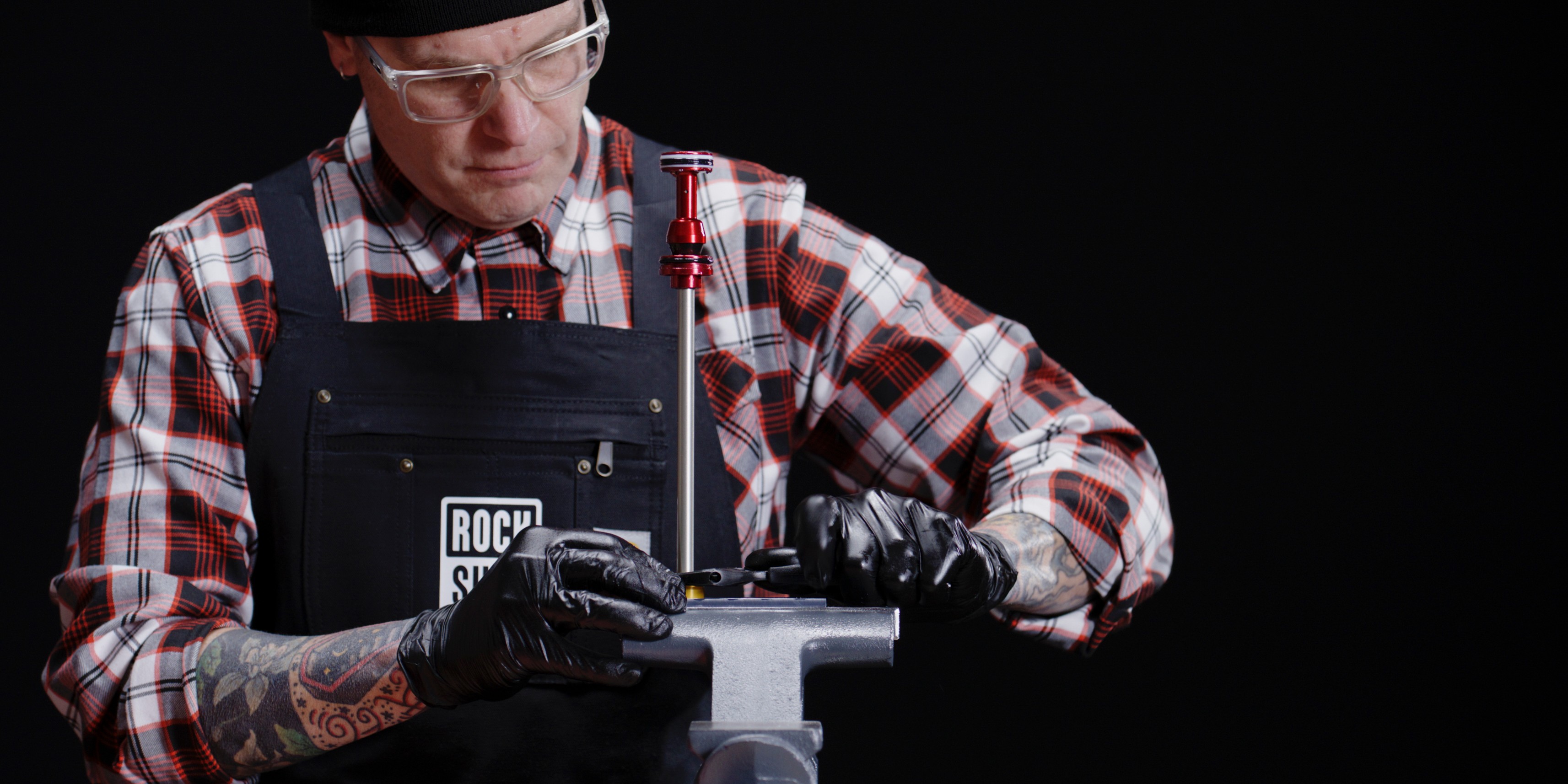 Woman with sunglasses walking down runway
