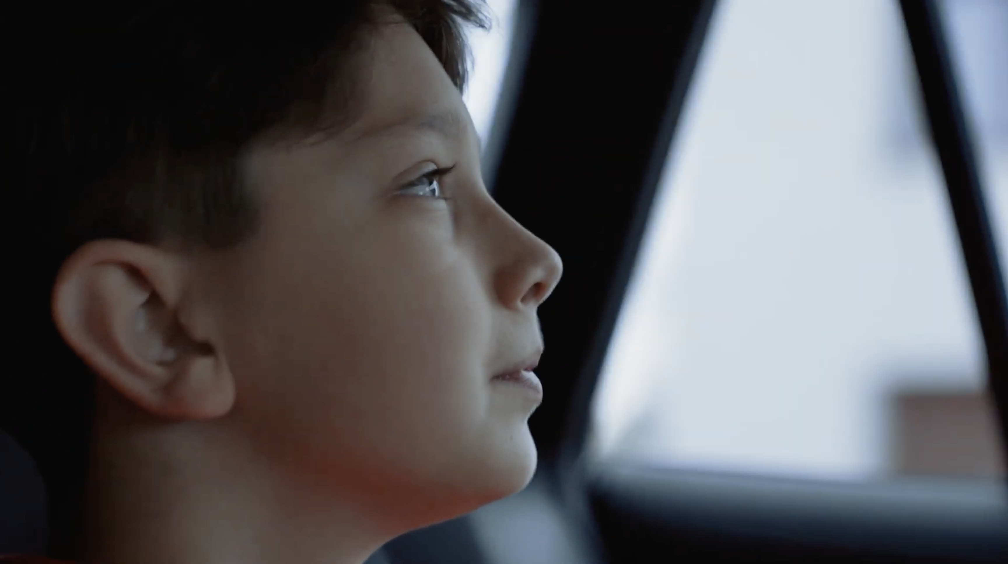 Woman with sunglasses walking down runway